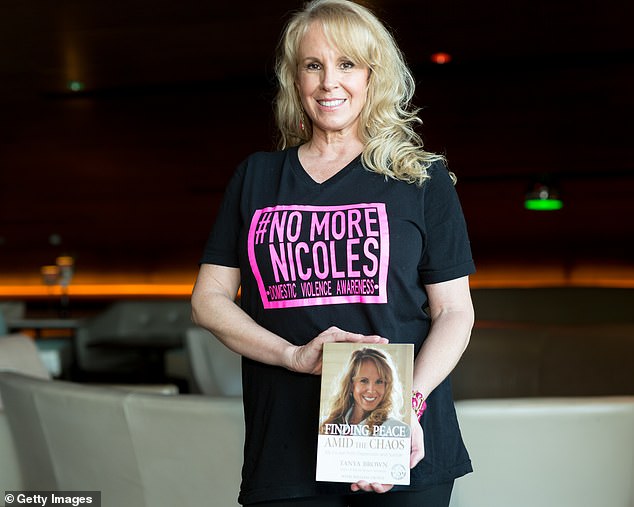 Tanya spoke about the gruesome murders, which left her sister almost decapitated, and said that although she had forgiven him, she would never forget him (pictured with her book Finding Peace Amid The Chaos: My Escape from Depression and Suicide).