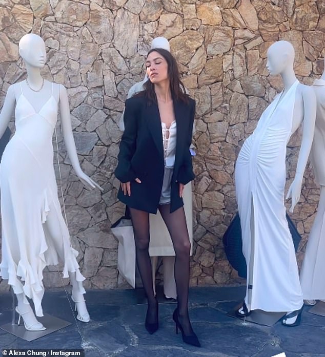 After arriving at the event, she posed next to some mannequins wearing some pieces from the collection that was launched on Tuesday.