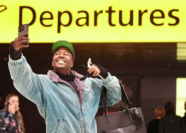 After taking a selfie next to the departures sign, Vas was photographed confidently maneuvering his luggage through the airport.