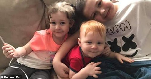 Lana (left) and Zayn (right), the victims of the accident, appear alongside their older brother Jayden in an earlier family photo.