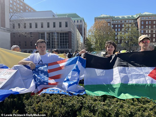 Students held flags in front of Columbia University