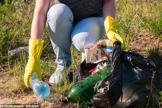 Public service: winning couple gives back to our community by picking up trash (file image)