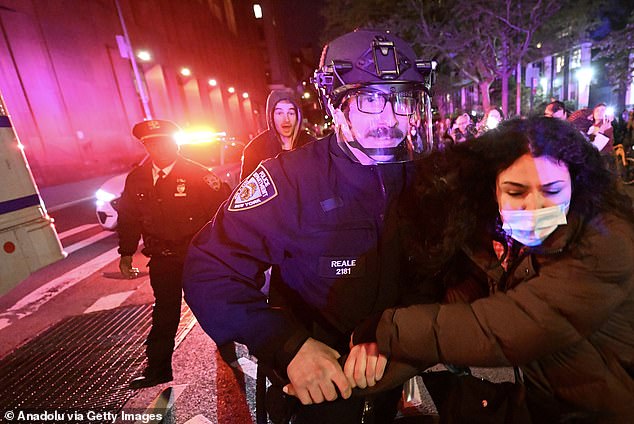 Police officers in riot gear stormed the New York University campus in Greenwich Village on Monday night and were forced to use zip ties to detain protesters.