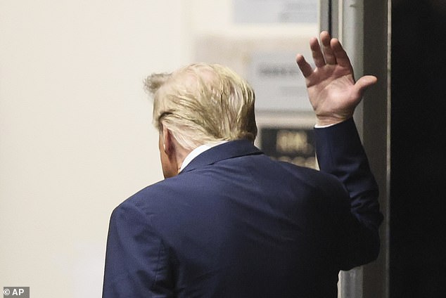 Republican presidential candidate and former President Donald Trump gestures as he walks in Manhattan Criminal Court in New York, Tuesday, April 23, 2024.