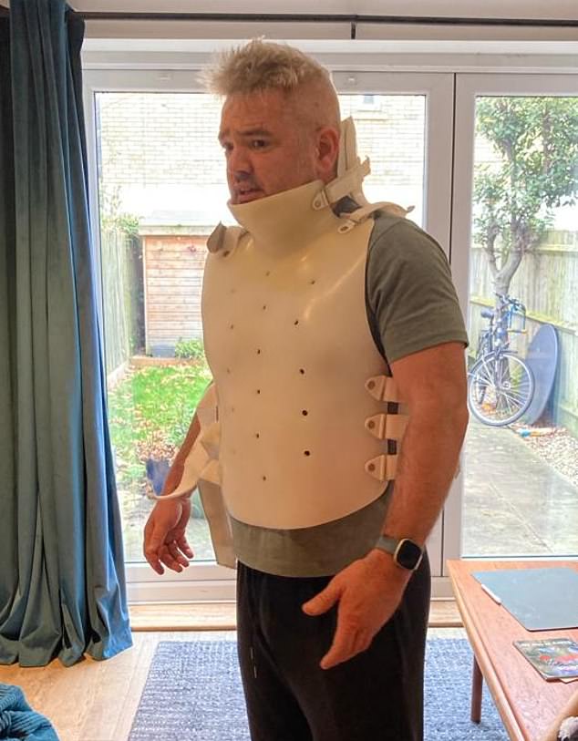 Mr. Windle, pictured with his back brace, was diagnosed with a rare type of myeloma called myeloma. 