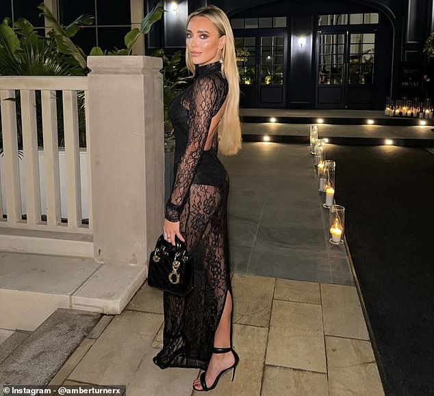 The former TOWIE star was on a brightly lit street as she posed in the dress which featured a high-cut, opaque black bodice.