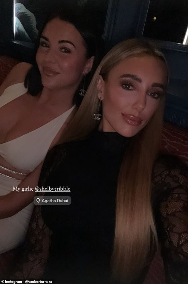 She enjoyed her night out with her friend Shelby Tribble, who contrasted Amber in a low-cut white dress.