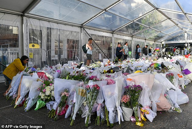 Tahir will be buried on Friday, following the funeral of fellow victim Jade Young on Tuesday (pictured, flowers left outside the shopping centre)