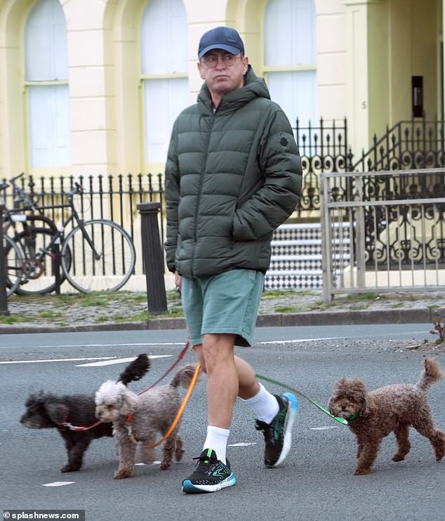 Stephen was seen taking his dogs for a walk after sharing the news of his marital split.