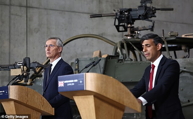 NATO Secretary General Jens Stoltenberg (L) and British Prime Minister Rishi Sunak give a press conference at the Armored Brigade in Warsaw on April 23, 2024.