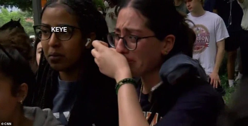 Protesters at UT Austin were seen sobbing as they watched police enter the scene.