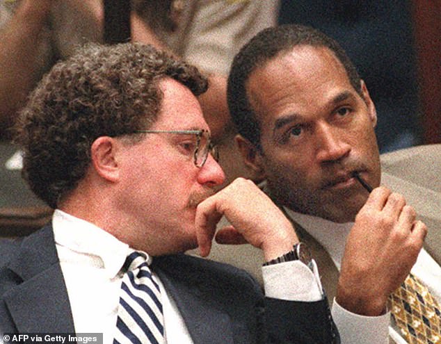 Simpson was tried in 1994 and 1995 for allegedly murdering his ex-wife Nicole Brown and her friend Ron Goldman;  seen with defense lawyer Peter Neufeld