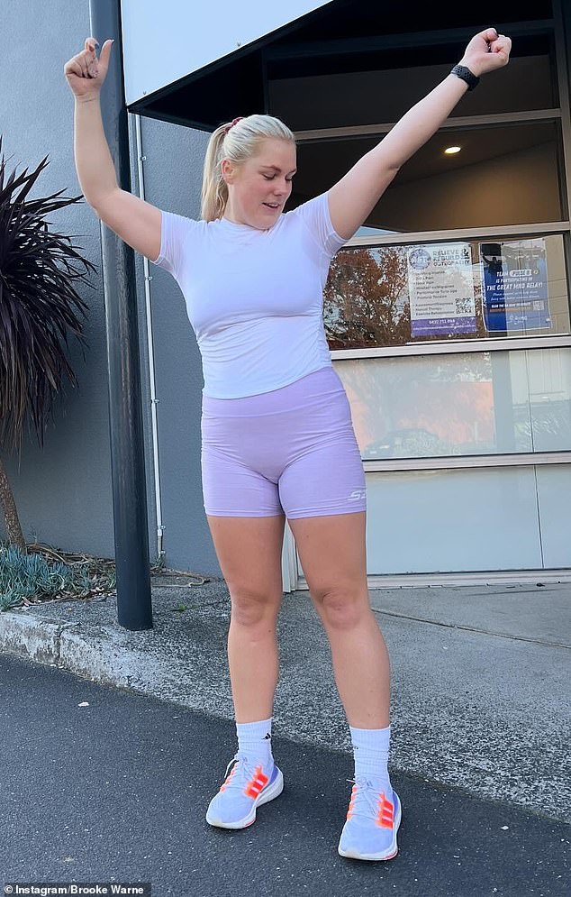 Posting a series of photos to her 75.2k followers, Brooke flaunted her slim figure in skin-tight purple workout clothes as she celebrated her milestone.