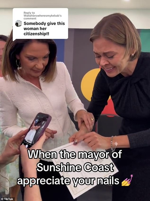 Even Sunshine Coast Mayor Rosanna Natoli (left), who presided over the citizenship ceremony, was impressed by Mila's manicure.