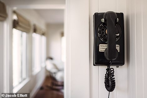 He kept a rotary telephone hanging on the wall as an ode to the estate's history.
