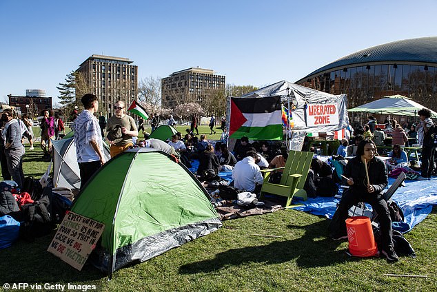 Pro-Palestinian supporters from Harvard University and the Massachusetts Institute of Technology demonstrate at MIT at a Palestine camp at MIT in Cambridge, Massachusetts.