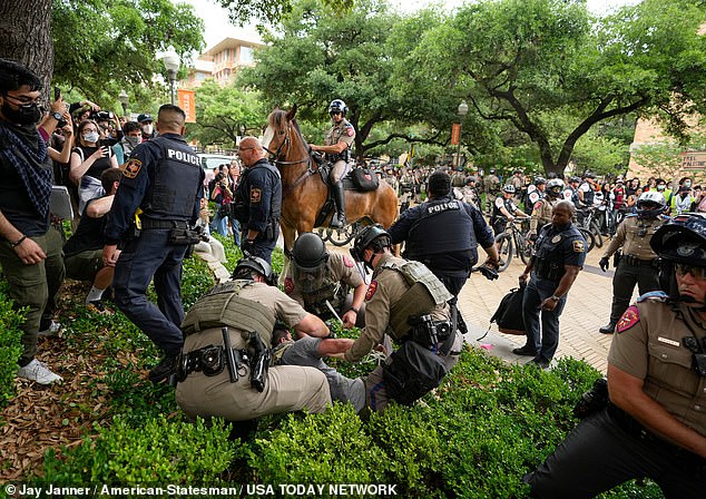 Police arrested protesters at UT Austin after warning them they could face criminal charges if they did not disperse.