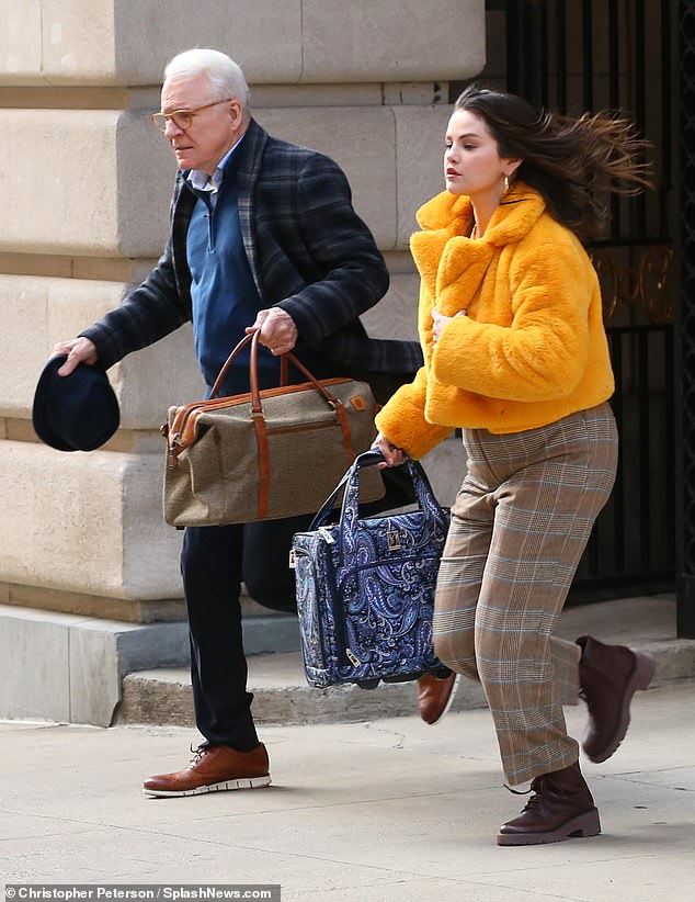 The duo filmed a scene where they ran out into the street with luggage in hand.