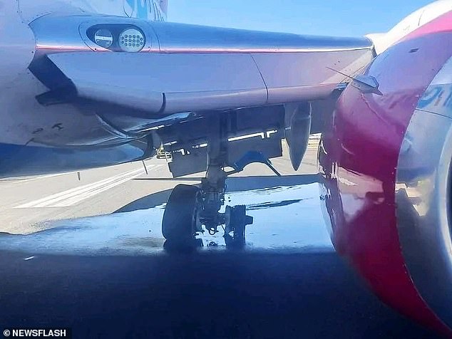 Closer images show the wheel without tire.  Security staff at OR Tambo International Airport in Johannesburg, South Africa, noticed that the FlySafair plane had damaged its landing gear during takeoff on April 21.