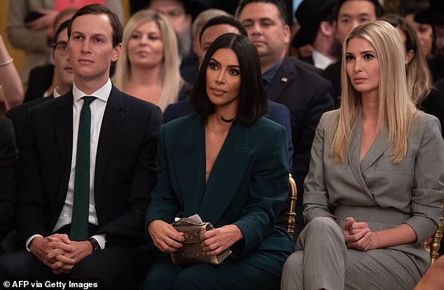 Reality TV star Kim Kardashian (center) sits between Jared Kushner (left) and Ivanka Trump (right) at a White House event on criminal justice reform in June 2019.