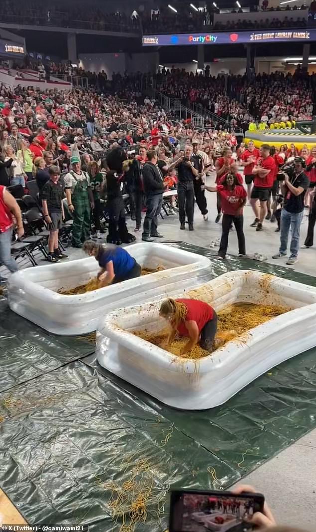 Students were forced to dive into pools full of chili in an attempt to find their Super Bowl ring.