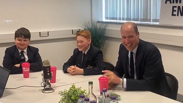Prince William revealed Princess Charlotte's favorite joke this morning during a surprise visit to the school on an engagement day in the West Midlands, where he joined Freddie Hadley (centre) on the school radio station.