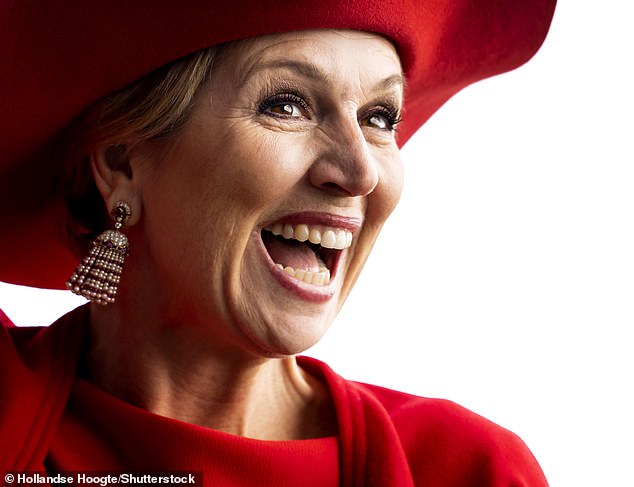 Even Máxima's earrings incorporated flecks of red, complementing her all-crimson ensemble.