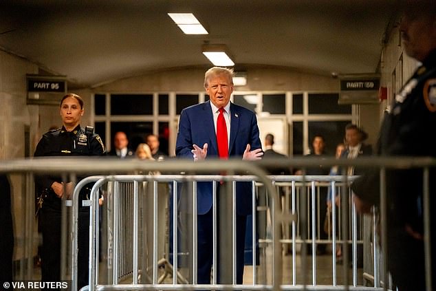 Trump addressed a television camera in the hallway before entering room 1530.