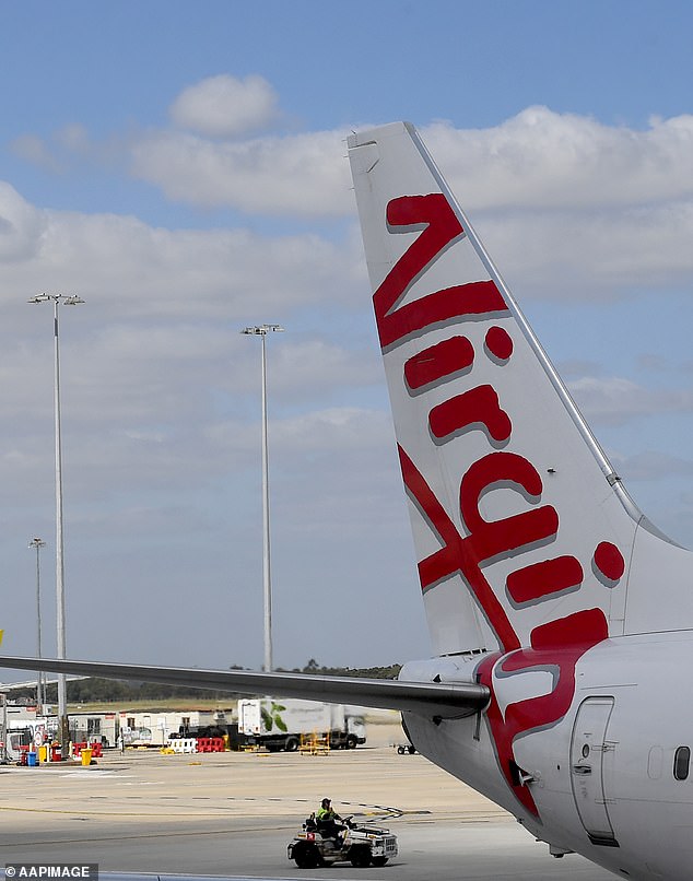 Tourists can still get from Adelaide to Bali with Virgin, but their travel time will now be reduced to around 14 hours and passengers will have to stopover in Brisbane, Sydney or Melbourne and transfer to a connecting flight.  Pictured is a Virgin plane.