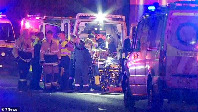 Emergency services had to rescue the woman, 38, and five-year-old boy from the wreckage after the collision in St Marys, western Sydney, shortly after 3am on Friday.