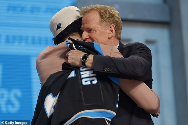 Bryce Young hugs NFL Commissioner Roger Goodell after being selected first overall by the Carolina Panthers in 2023