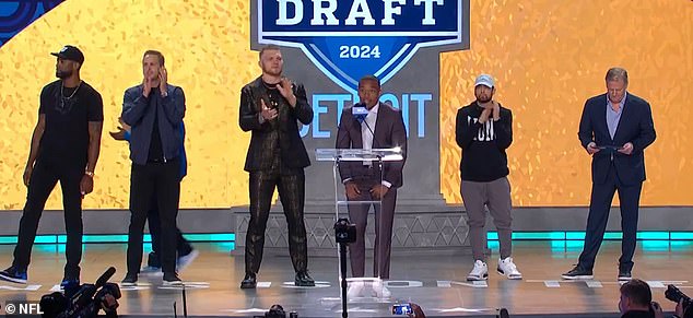 Eminem and Goodell were soon joined (from left) by Calvin Johnson, Jared Goff, Aidan Hutchinson and Amon-Ra St. Brown.
