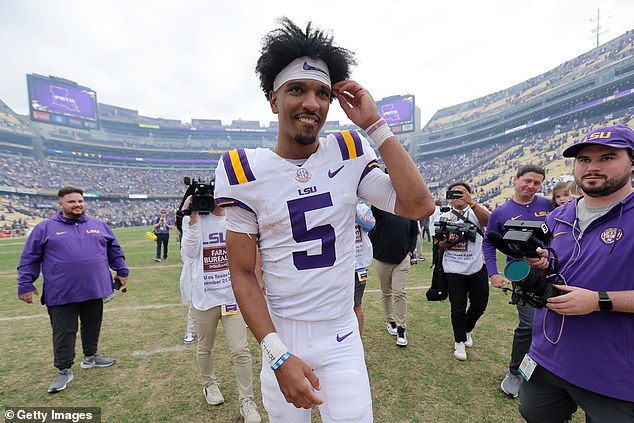 Jayden Daniels celebrates after a game against the Texas A&M Aggies at Tiger Stadium.