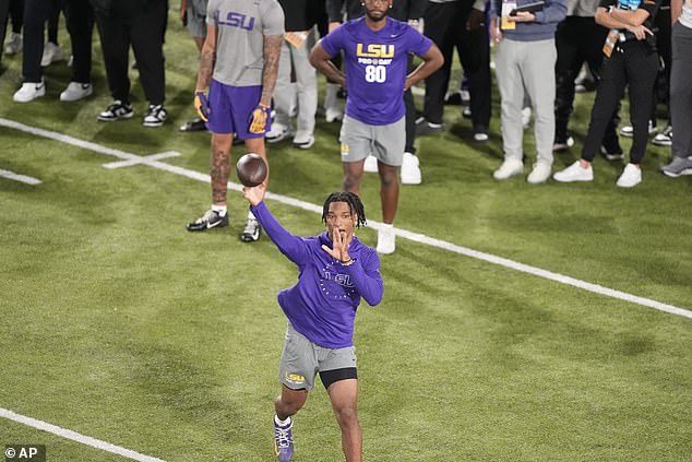 LSU quarterback Jayden Daniels goes through passing drills during the Tigers' pro day in April.