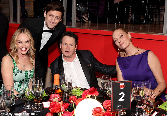 During the event's dinner, Michael and Tracy were seated next to fellow movie star Uma Thurman, and the trio posed for a photo with comedian Alex Edelman.