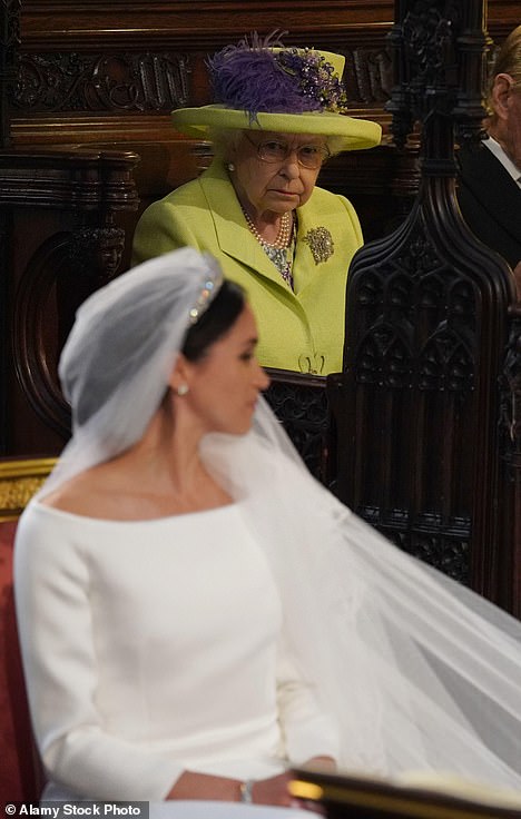 Queen Elizabeth Reportedly Considered Meghan Markle's Wedding Dress 'Too White' for a Divorced Woman