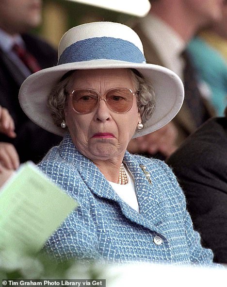 Something in the air? The Queen seems to think so at the Royal Windsor Horse Show