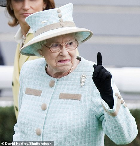 Queen Elizabeth wags her finger at Newbury Racecourse in 2011