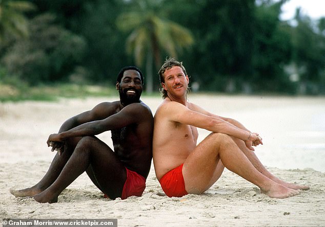 Richards with his great friend Ian Botham enjoying a day at the beach