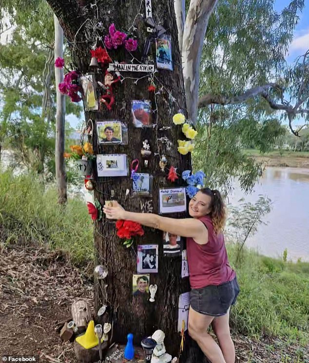 Mr Wheeler's mother installed a memorial to her son in a tree at Memorial Gardens in Rockhampton. In the photo a friend of Mr. Wheeler appears with the tree.