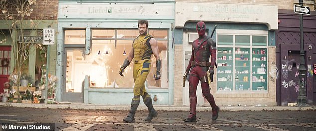 Jackman showed off his torn arms while patrolling the streets with Reynolds' Deadpool.
