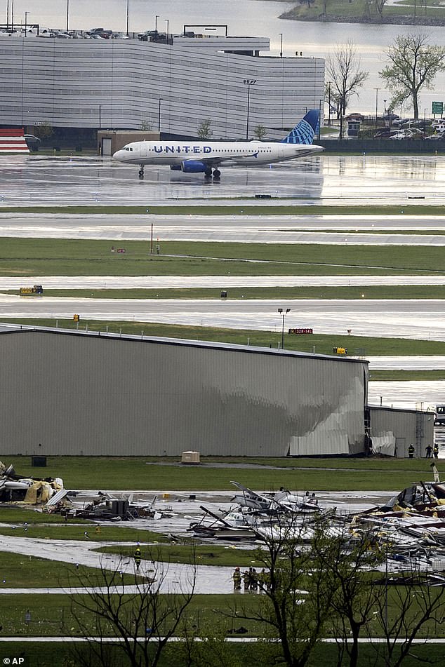 Severe weather damage at Eppley Airfield in Omaha, Nebraska, leaving planes overturned