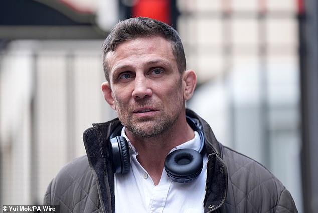 Alex Reid leaves the Rolls building in central London after attending a bankruptcy hearing for his former partner Katie Price.