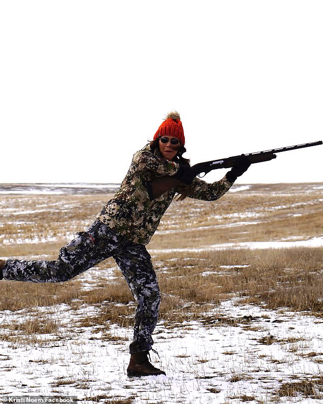 A Facebook image shows South Dakota Governor Kristi Noem with a gun.  In her next book, she writes about Cricket, a 14-month-old wirehaired pointer, who Noem shot in the gravel pit on her family's property, moments before her children returned from school.