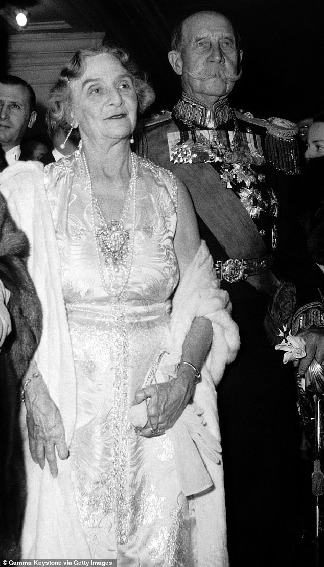 Mary Bonaparte with her husband, Prince George of Greece and Denmark.  They are photographed at the Paris opera in 1954.