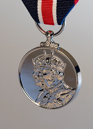 The coronation medal features an effigy of King Charles and Queen Camilla on the front.