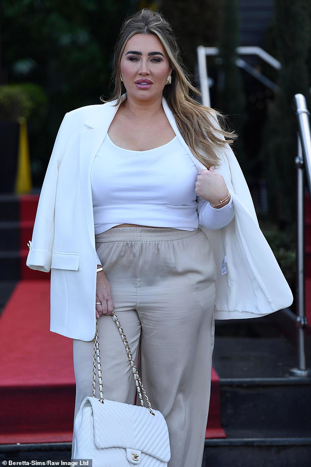 The star, who was the inaugural cast member of the hit reality show, looked gorgeous in loose-fitting khaki pants and a long-sleeved white blouse.