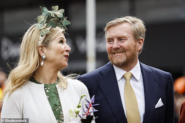 Máxima was a vision in an olive green dress, which featured a subtle floral design.