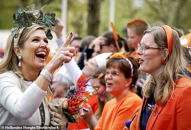 The Dutch queen, 52, and her husband, King Willem-Alexander, were in high spirits as they met with students from the KBS Klippeholm and CBS Vesterhave schools.