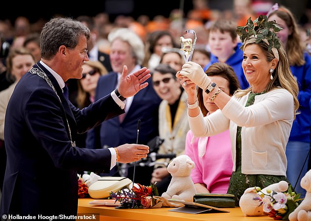 Queen Máxima was seen presenting a small silver trophy during the event.